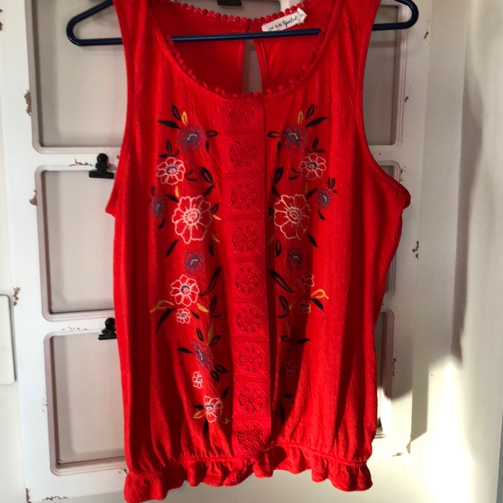 Sleeveless red shirt